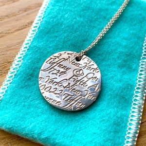 Tiffany & Co notes pendant and necklace